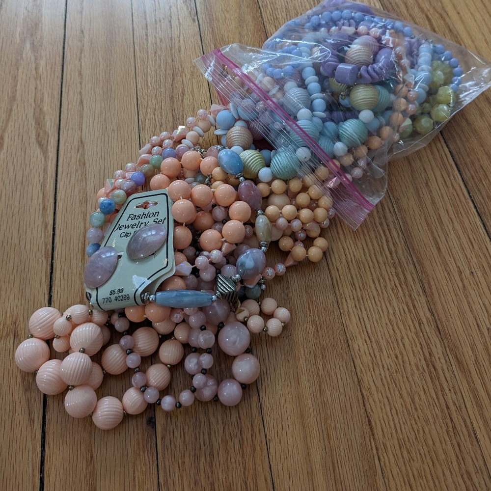 Bag of chunky pastel necklaces
